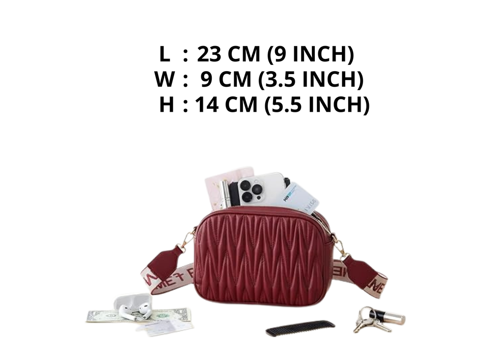 A burgundy quilted camera bag shown on a white background with text listing its dimensions: L 23 cm (9 inch), W 9 cm (3.5 inch), H 14 cm (5.