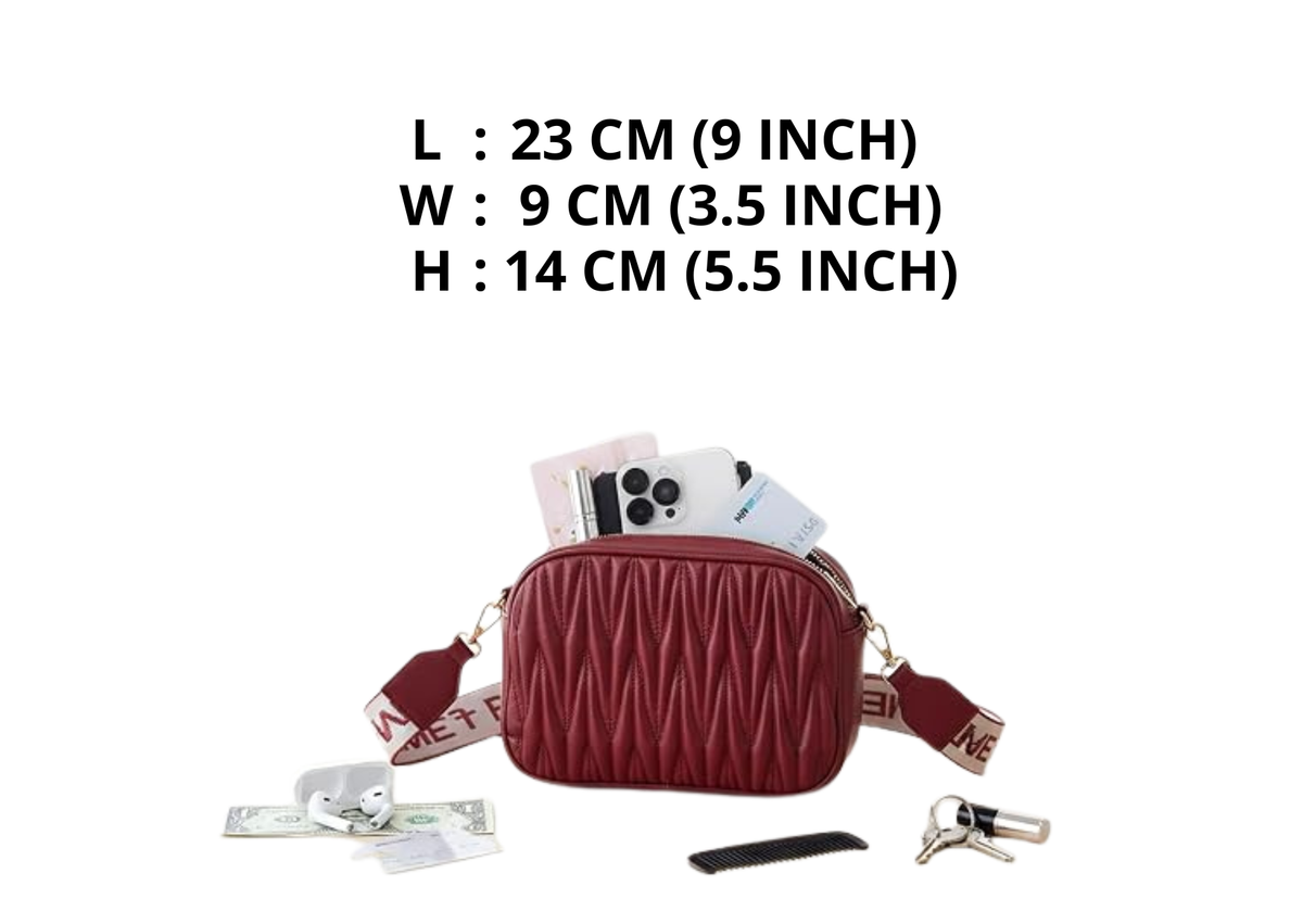 A burgundy quilted camera bag shown on a white background with text listing its dimensions: L 23 cm (9 inch), W 9 cm (3.5 inch), H 14 cm (5.