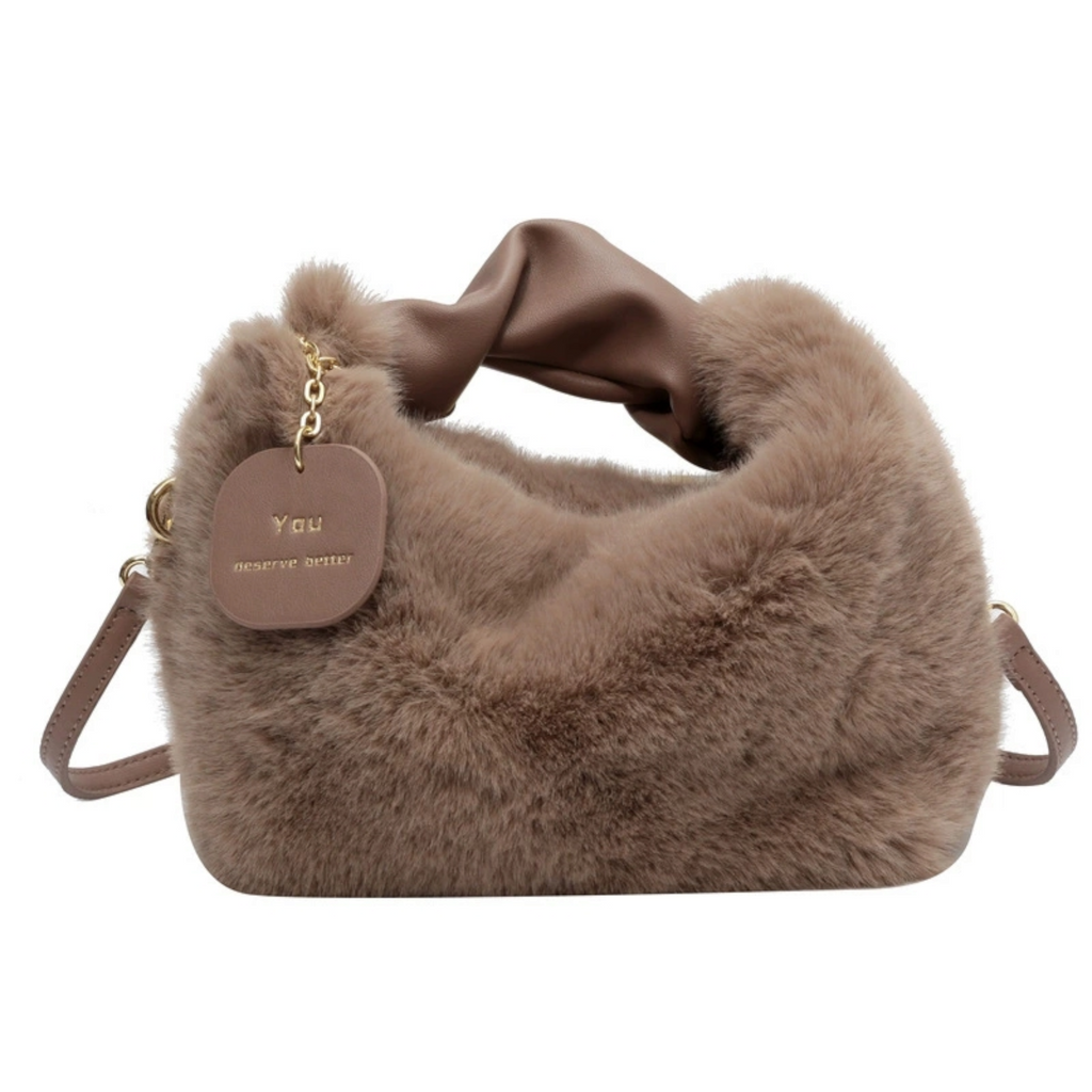 Brown faux fur sling bag for women with gold chain strap — front view
Brown faux fur sling bag showing plush texture and gathered handle — close-up